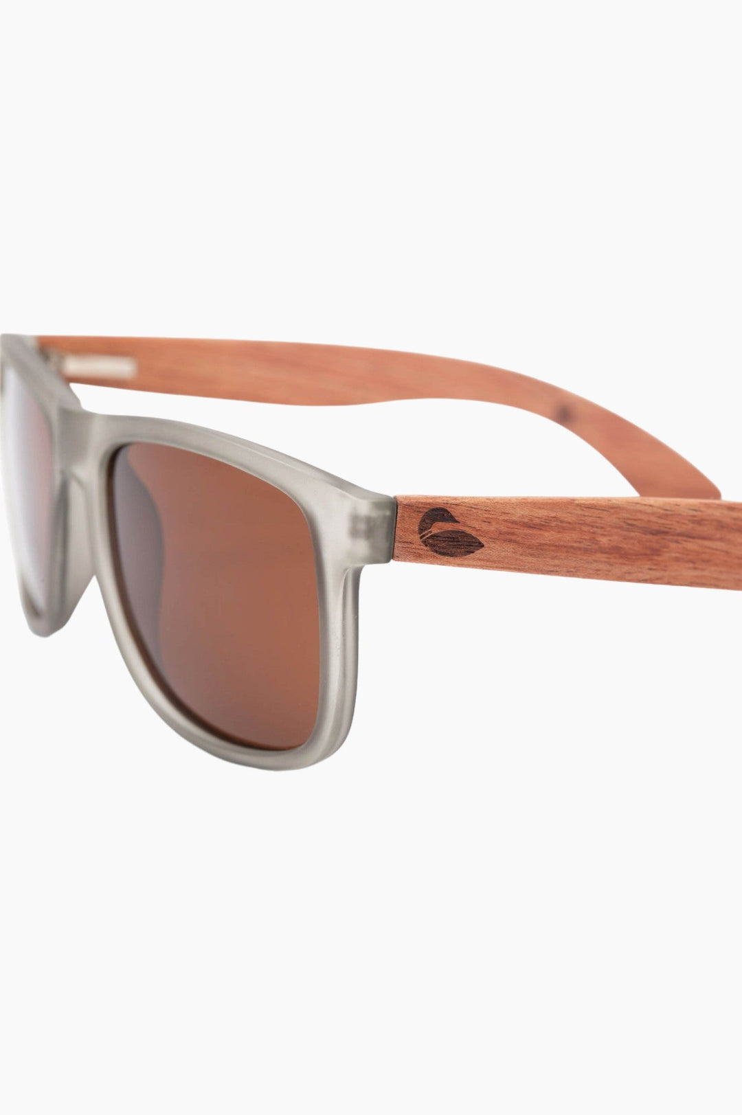 Clear, grey-tinted framed sunglasses with wooden temple piece.