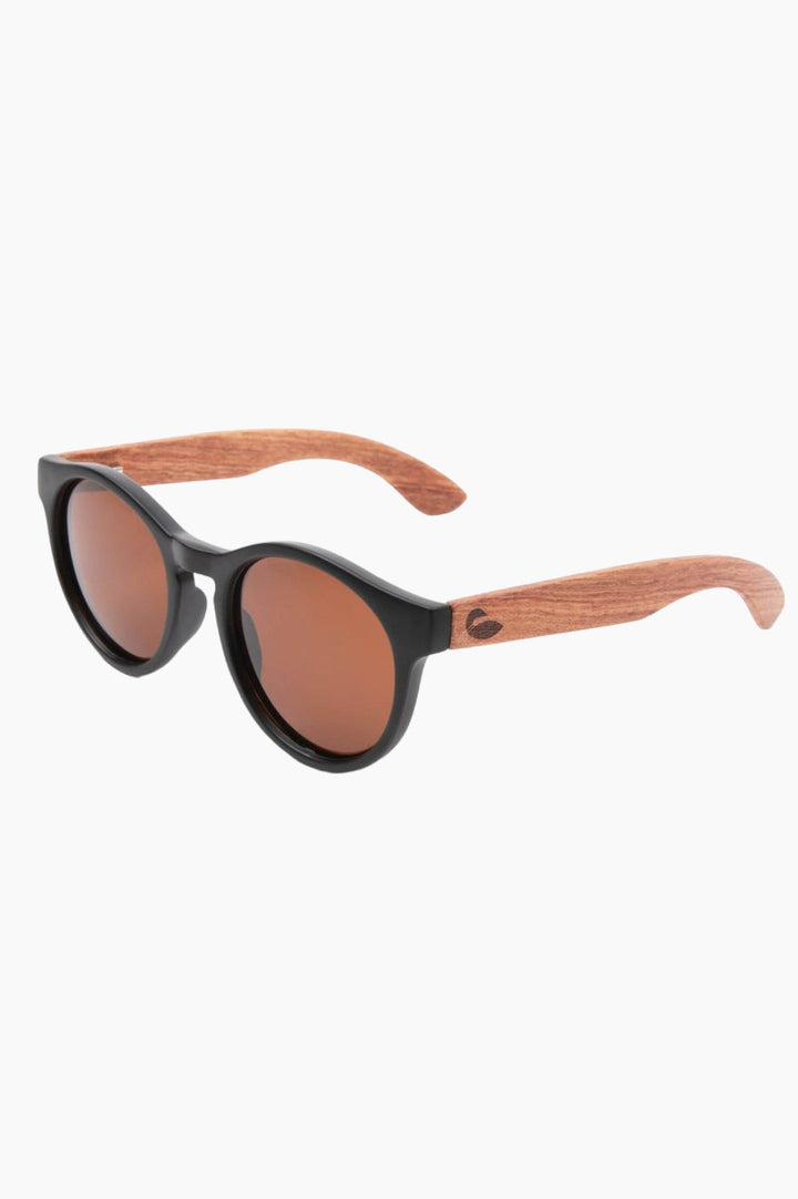 Matte black round sunglass frames with wood temple piece with a loon on them.