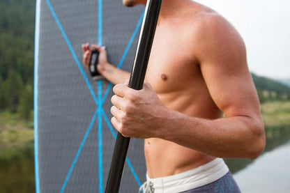 Man holding carbon shaft paddle